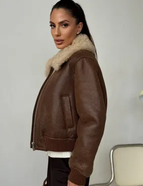 Короткая дубленка - женская - фото 5