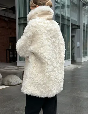 Белая шубка из тиградо - фото 9